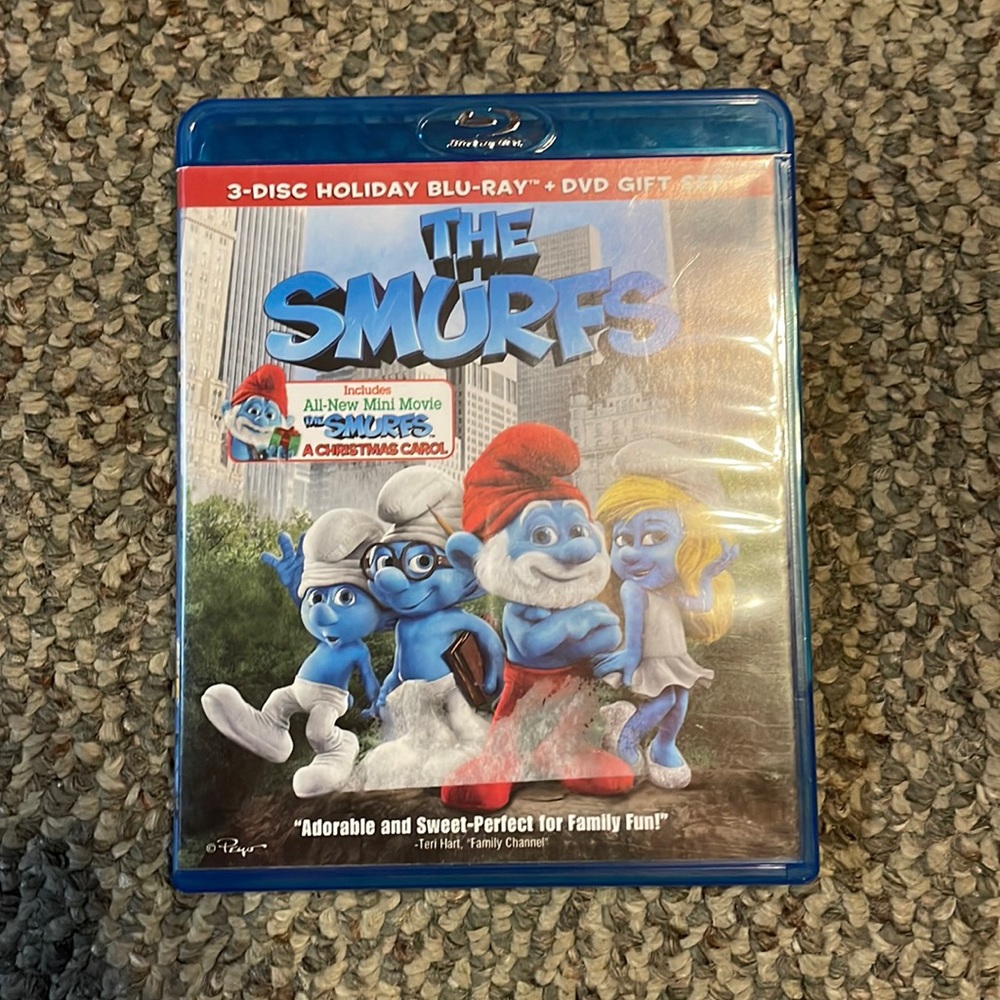 The Smurf’s dvd and blu-ray set with bonus Smurfs Christmas Carol dvd.